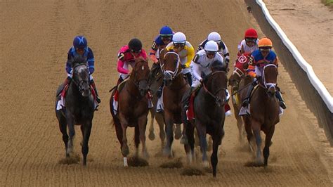 Mo Donegal pulls ahead to win 2022 Belmont Stakes .